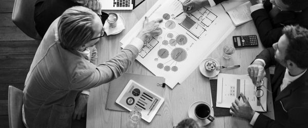 Aerial view of business people brainstorming together