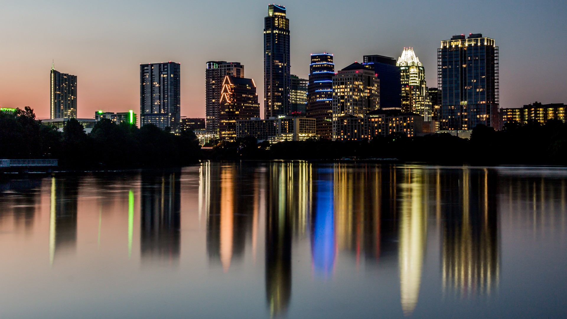 The summer sun sets on Austin, TX on a humid August evening.