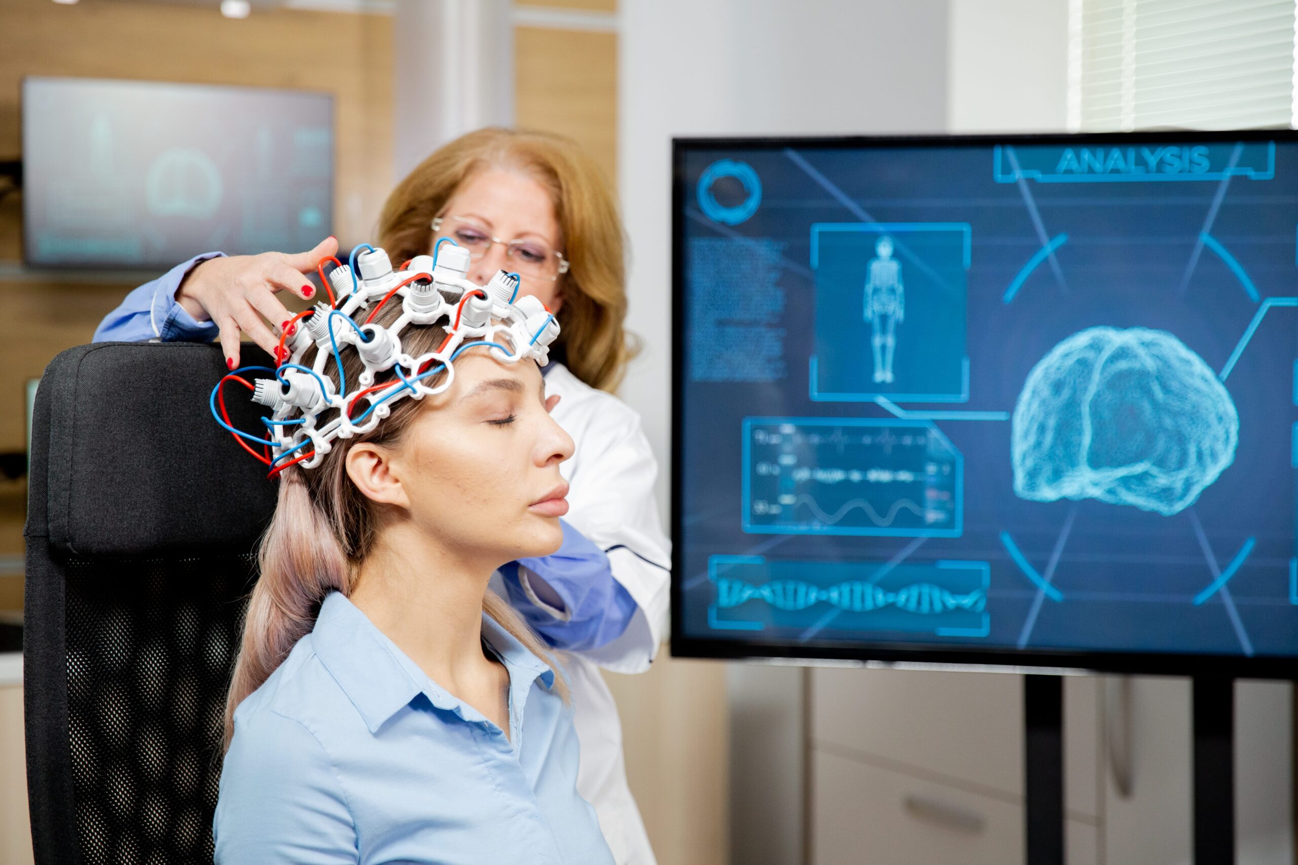 doctor-arranging-scanning-device-head-female-patient-min